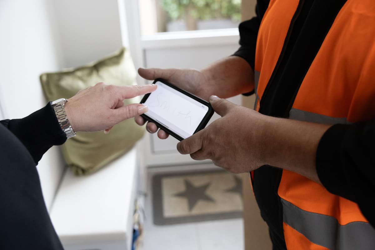 customer-signing-for-their-delivery.jpg